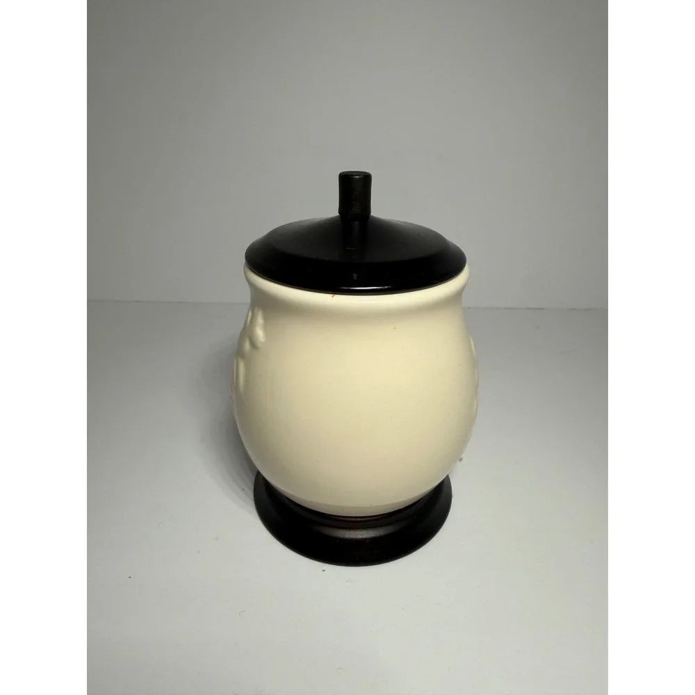 Cream Ceramic Jar with Embossed Floral Vine and Dark Brown Lid and Base